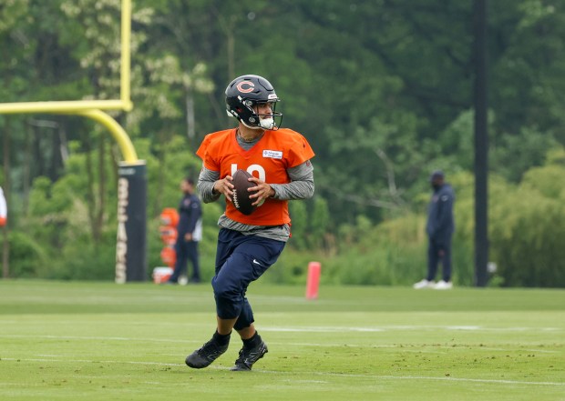 Quarterback Caleb Williams runs through drills during Bears minicamp at Halas Hall on June 4, 2025, in Lake Forest. (Stacey Wescott/Chicago Tribune)