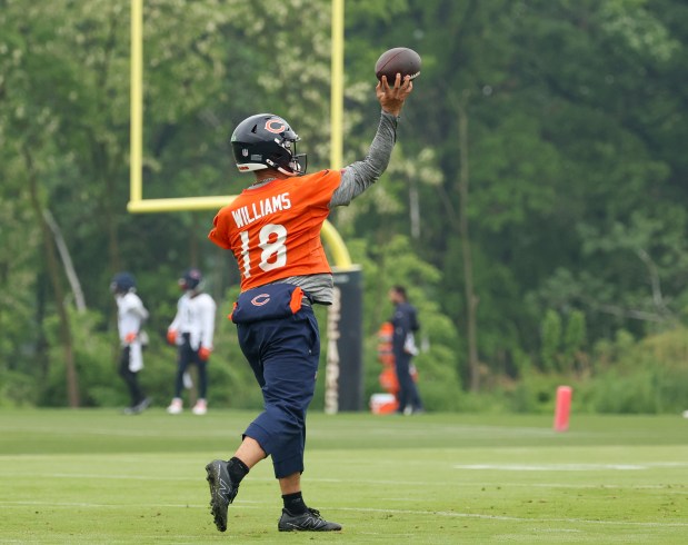 Quarterback Caleb Williams runs through drills during Bears minicamp at Halas Hall on June 4, 2025, in Lake Forest. (Stacey Wescott/Chicago Tribune)