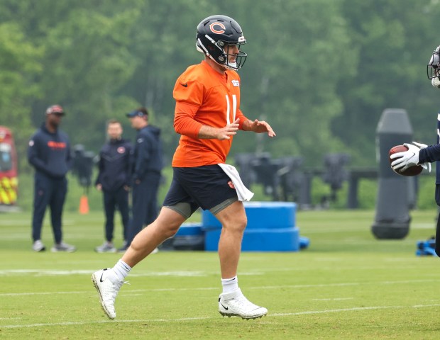 Quarterback Case Keenum runs down the field during Bears minicamp at Halas Hall on June 4, 2025, in Lake Forest. (Stacey Wescott/Chicago Tribune)