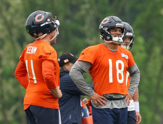 Quarterbacks Case Keenum (11) and Caleb Williams during Bears minicamp at Halas Hall on June 4, 2025, in Lake Forest. (Stacey Wescott/Chicago Tribune)