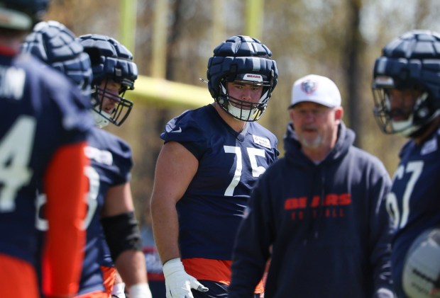Offensive tackle Ozzy Trapilo (75) listens to instructions during Bears rookie camp at Halas Hall on May 9, 2025, in Lake Forest. (Stacey Wescott/Chicago Tribune)