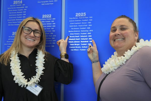 2025 El Camino College Athletics Hall of Fame inductees Beverly Hazell, left, and Elizabeth Hazell pain to their names on the Wall of Fame inside the Gymnasium on Thursday, May 29. Beverly was a First-Team All American in women's volleyball and holds the record for most kills in a match with 33. Elizabeth made the All-SCC Second Team in her freshman season and was named the ECC Athlete of the Year in 2001. (Eddy Cermeno | The Union)