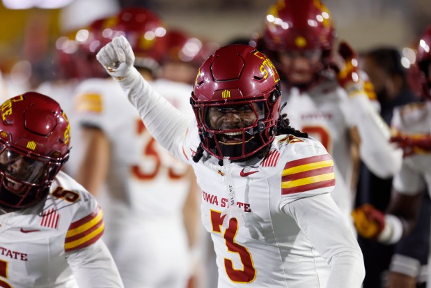 Iowa State defensive back Jontez Williams (3) celebrates his fourth-quarter interception during an NCAA football game against West Virginia on Saturday, Oct. 12, 2024, in Morgantown W.Va. (AP Photo/Mike Buscher)