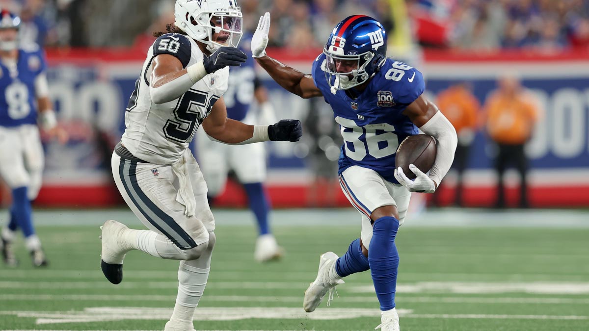 Sep 26, 2024; East Rutherford, New Jersey, USA; New York Giants wide receiver Darius Slayton (86) runs with the ball against Dallas Cowboys linebacker Eric Kendricks (50) during the second quarter at MetLife Stadium.