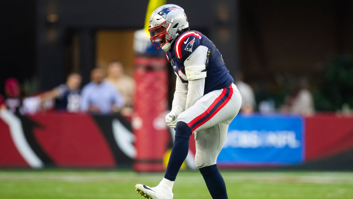 New England Patriots defensive end Deatrich Wise Jr. (91) celebrates a play against the Arizona Cardinals at State Farm Stadium.