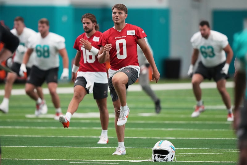 Miami Dolphins quarterback Zach Wilson (0) does drills during practice at minicamp, Wednesday, June 11, 2025, in Miami Gardens, Fla.