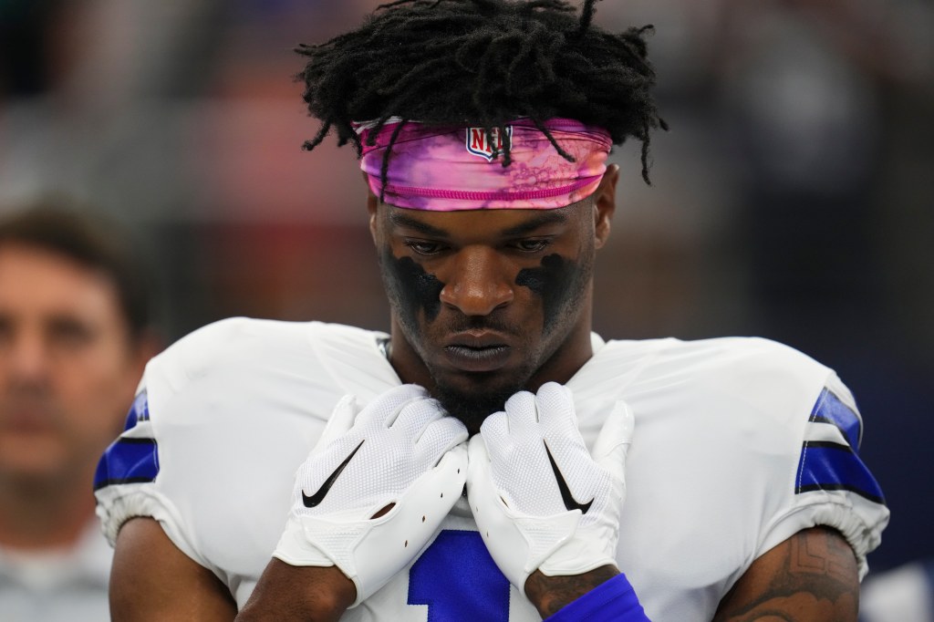 Kelvin Joseph #1 of the Dallas Cowboys stands during the national anthem against the Washington Commanders at AT&T Stadium on October 2, 2022 in Arlington, Texas.