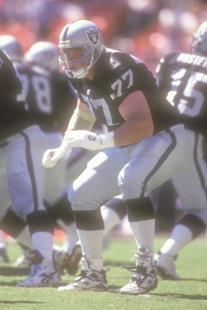 WASHINGTON,DC - SEPTEMBER 10: Rich Stephens #77 of the Oakland Raiders in position during a football game against the Washington Redskins on September 10, 1995 at RFK Stadium in Washington, DC. The Raiders won 20-8. (Photo by Mitchell Layton/Getty Images)