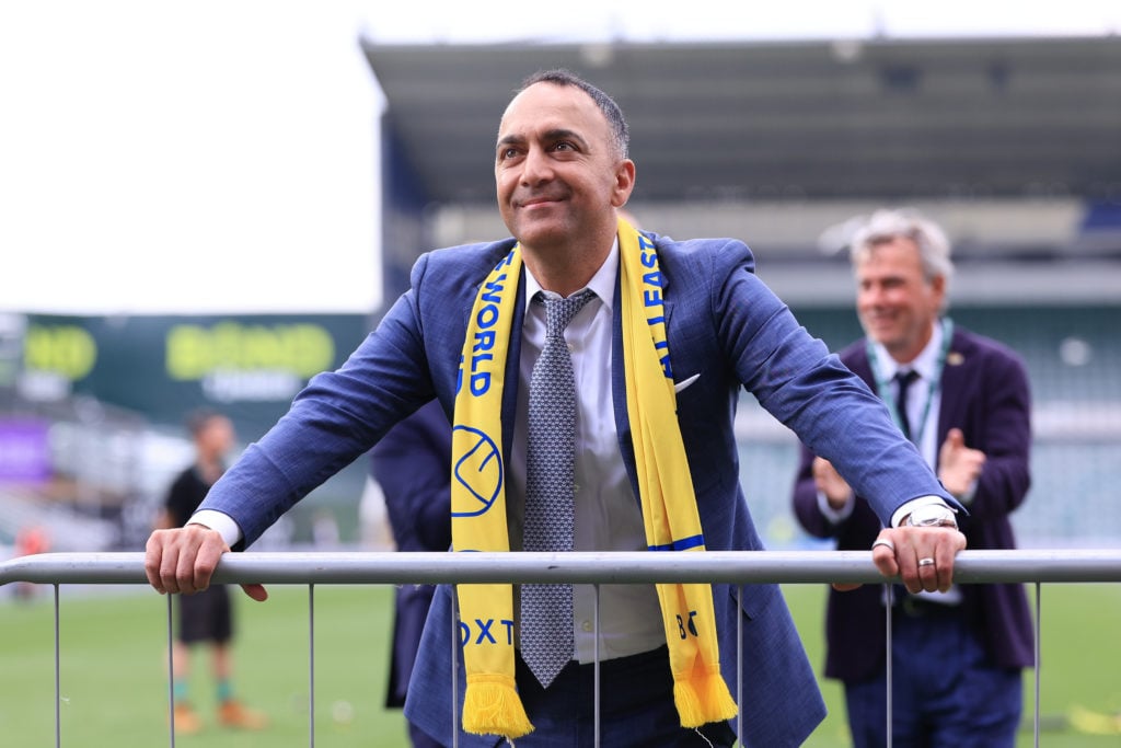Leeds United chairman Paraag Marathe celebrates the club's promotion to the Premier League.