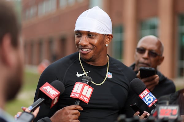 Falcons quarterback Michael Penix Jr. speaks to members of the media at the team's training facility on Tuesday, May 27, 2025, in Flowery Branch. If the Falcons are going to fly, the offense, with quarterback Penix at the controls, will have to carry the team in the offensively driven NFL. (Jason Getz/AJC)