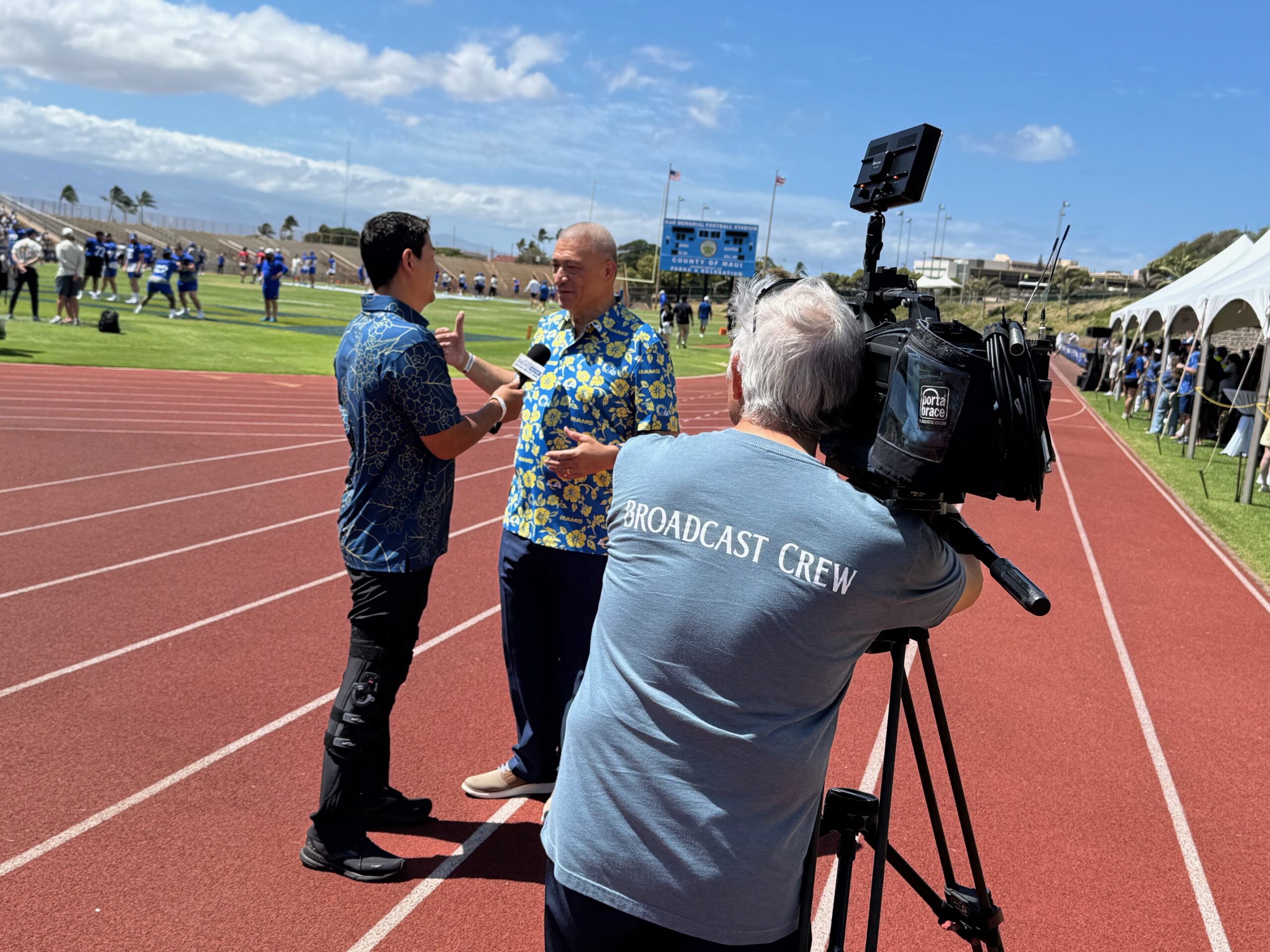 Maui County Mayor Richard Bissen is interviewed by Steve Uehara on Tuesday at War Memorial Stadium. HJI / ROB COLLIAS photo