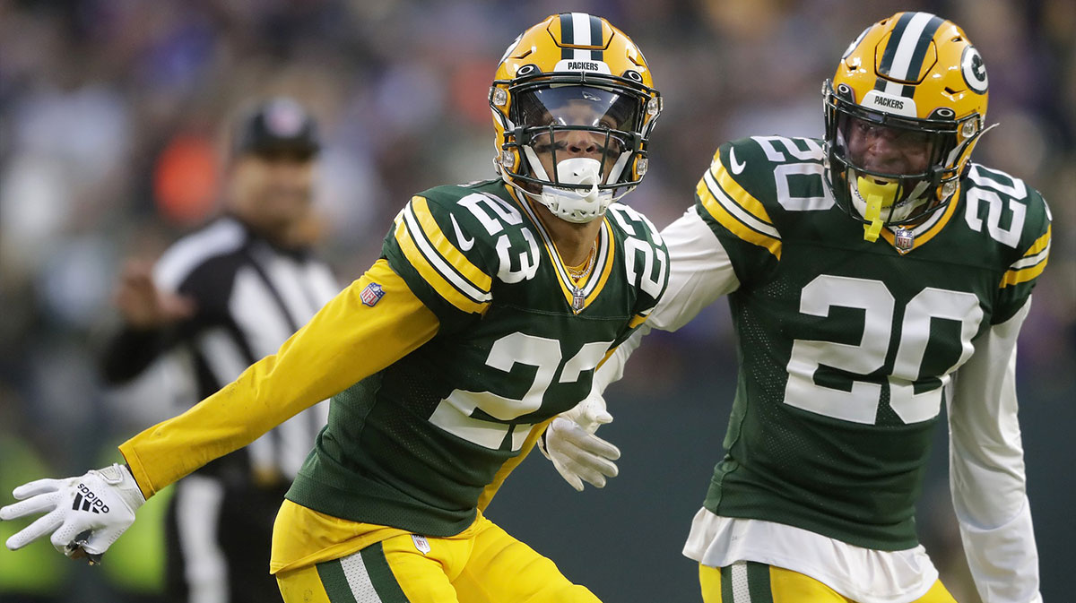 Green Bay Packers cornerback Jaire Alexander (23) and safety Rudy Ford (20) celebrate after breaking up a pass play against the Minnesota Vikings during their football game at Lambeau Field.