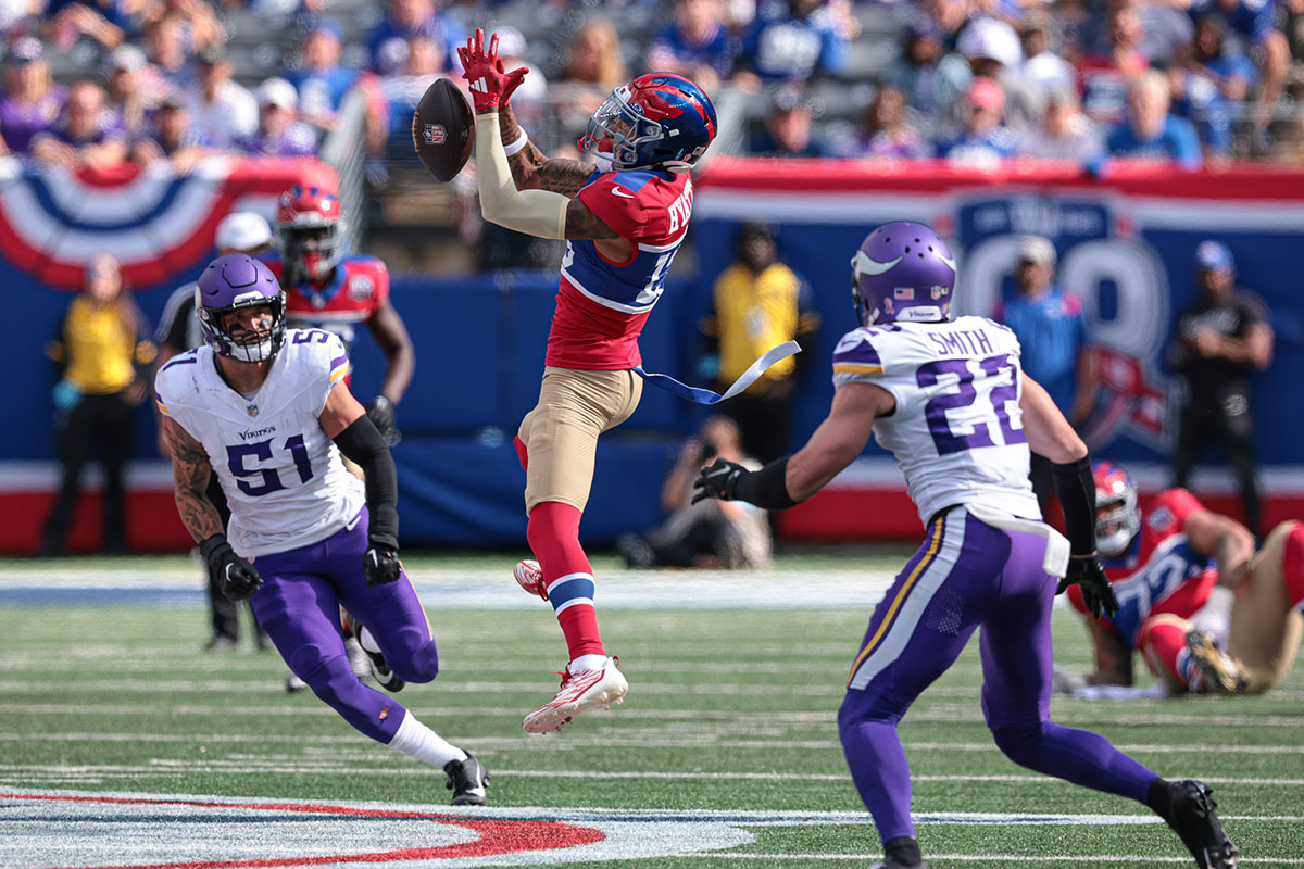 Jalin Hyatt attempting to catch a pass against the Vikings during the Giants' Week 1 game.