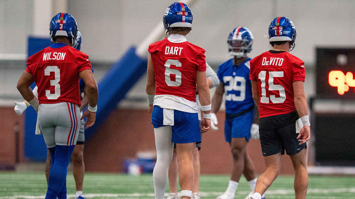 New York Giants quarterbacks Russell Wilson (3), Jaxson Dart (6) and Tommy DeVito (15) perform drills together during Mandatory Minicamp at Quest Diagnostics Giants Training Center.