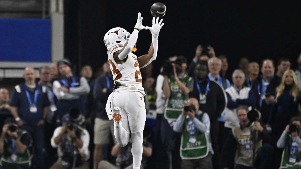 Texas Longhorns running back Jaydon Blue (23) makes a touchdown catch during the third quarter of the College Football Playoff semifinal against the Ohio State Buckeyes in the Cotton Bowl at AT&T Stadium.