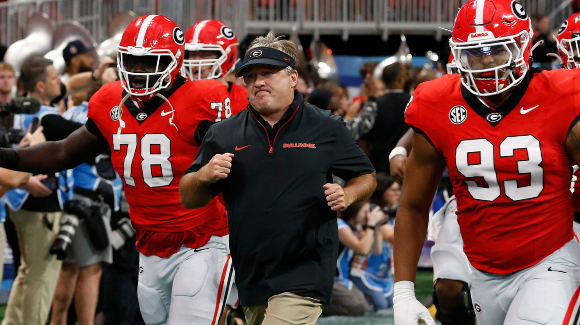 Georgia coach Kirby Smart leads his team onto the field before the start of the NCAA Aflac Kickoff Game in Atlanta, on Saturday, Aug. 31, 2024.