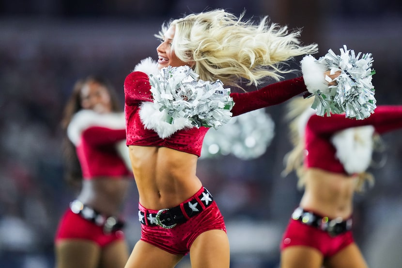 Dallas Cowboys Cheerleaders perform during the second half of an NFL football game against...