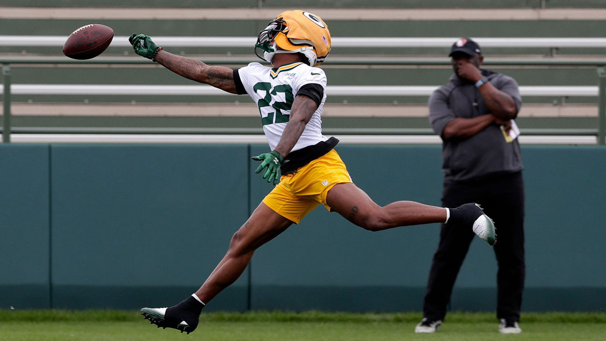 Green Bay Packers wide receiver Matthew Golden (22) misses the ball during the team's first day of minicamp on June 10, 2025, at Ray Nitschke Field in Ashwaubenon, Wis.