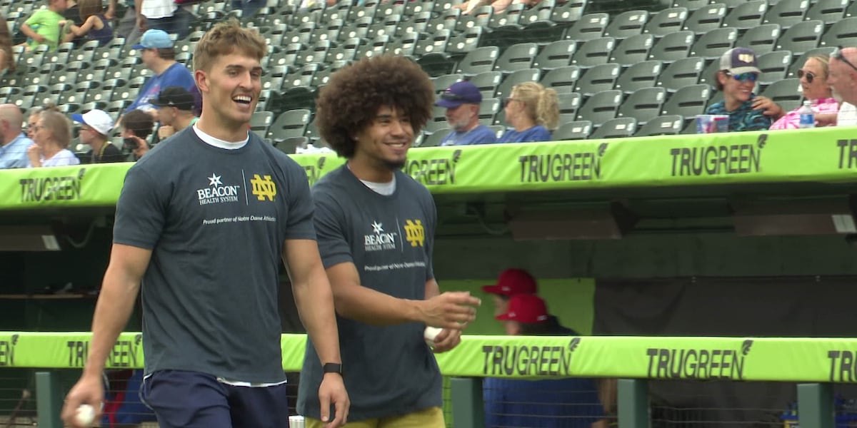 Notre Dame football players throw out first pitch at South Bend Cubs game