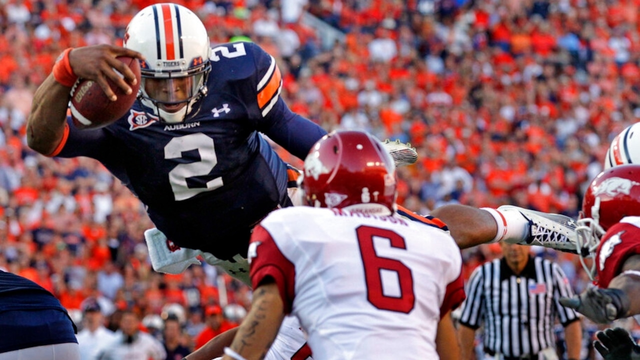 How many former Auburn players are eligible for the College Football Hall of Fame?