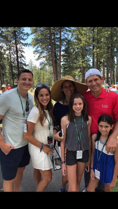 Christian and Ashlee Stewart pose for a picture with Steve and Barb and two of the Young's children in Lake Tahoe.