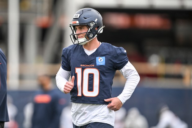Bo Nix (10) of the Denver Broncos jogs during OTAs at Broncos Park in Englewood, Colorado on Thursday, May 29, 2025. (Photo by AAron Ontiveroz/The Denver Post)