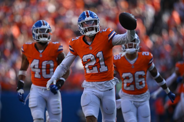 Denver Broncos cornerback Riley Moss (21) runs up the field after making an interception during the third quarter of the game at Empower Field at Mile High in Denver on Oct. 6, 2024. The Denver Broncos beat the Las Vegas Raiders 34-18. (Photo by Helen H. Richardson/The Denver Post)