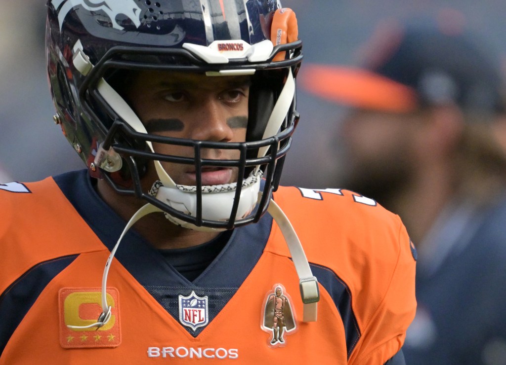 When is Russell Wilson officially off Denver's books?