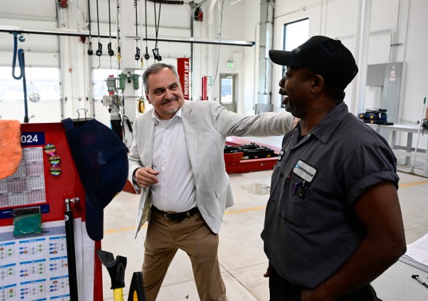 Denver Water CEO Alan Salazar, left, has a laugh with...