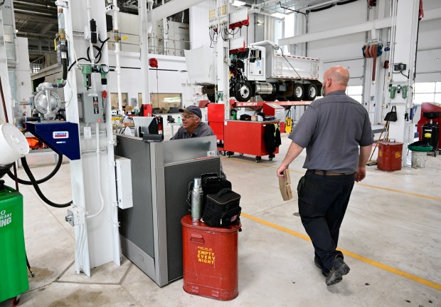 Denver Water mobile and heavy equipment mechanic Mike Wilkinson works...