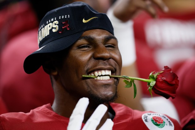 Que Robinson (34) of the Alabama Crimson Tide celebrates after defeating the Notre Dame Fighting Irish 31-14 in the 2021 College Football Playoff Semifinal Game at the Rose Bowl Game at AT&T Stadium on Jan. 01, 2021 in Arlington, Texas. (Photo by Tom Pennington/Getty Images)
