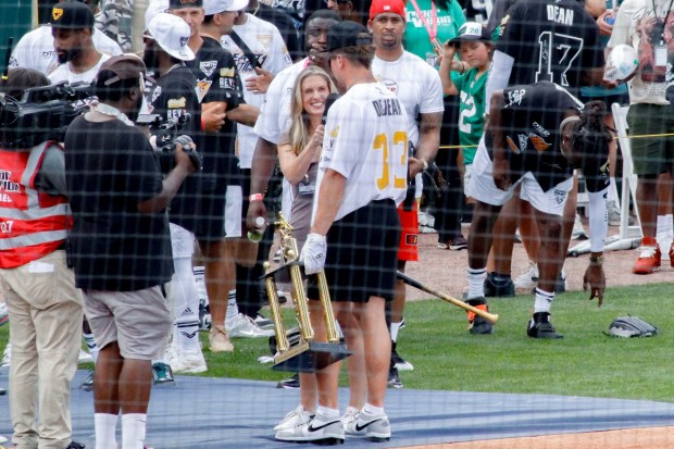 Philadelphia Eagles cornerback Cooper DeJean wins the home run derby and speaks with a reporter on the field Saturday, June 28, 2025, during the fourth annual Devonta Smith Celebrity Softball Game at Coca-Cola Park in Allentown. The event featured Eagles players competing in a home-run derby and a softball game. (Oliver Lois Economidis/The Morning Call)
