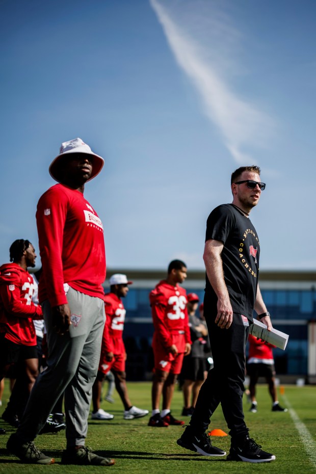 East Stroudsburg South coach Matt Walters, right, works at a Tampa Bay Buccaneers minicamp with the team's special teams assistant Keith Tandy. (Contributed photo / Tampa Bay Buccaneers)