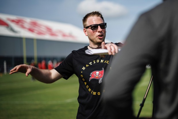 East Stroudsburg coach Matt Walters works with Tampa Bay Buccaneers players and coaches as part of the NFL Coaching Academy program. (Contributed photo / Tampa Bay Buccaneers)