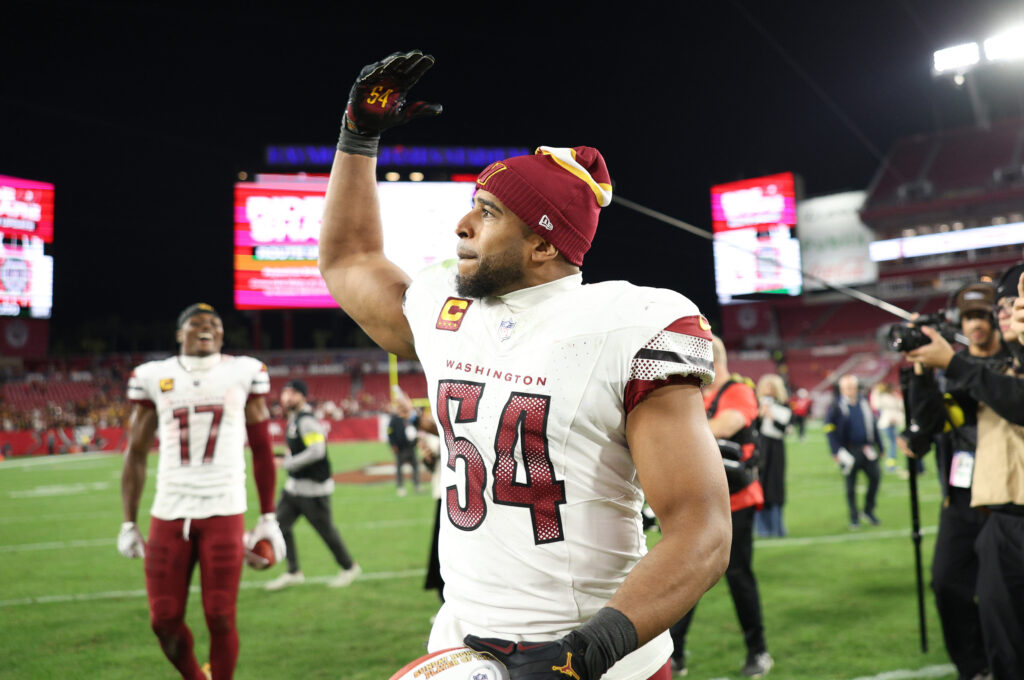 Washington Commanders linebacker Bobby Wagner (54) celebrates after winning a NFC wild card playoff against the Tampa Bay Buccaneers.