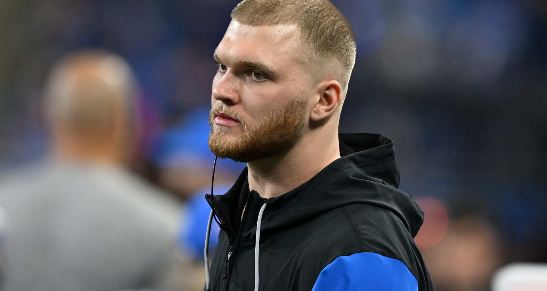 Detroit Lions defensive lineman Aidan Hutchinson (97) looks on from the bench during the fourth quarter against the Washington Commanders in a 2025 NFC divisional round game at Ford Field.