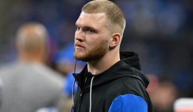 Detroit Lions defensive lineman Aidan Hutchinson (97) looks on from the bench during the fourth quarter against the Washington Commanders in a 2025 NFC divisional round game at Ford Field.