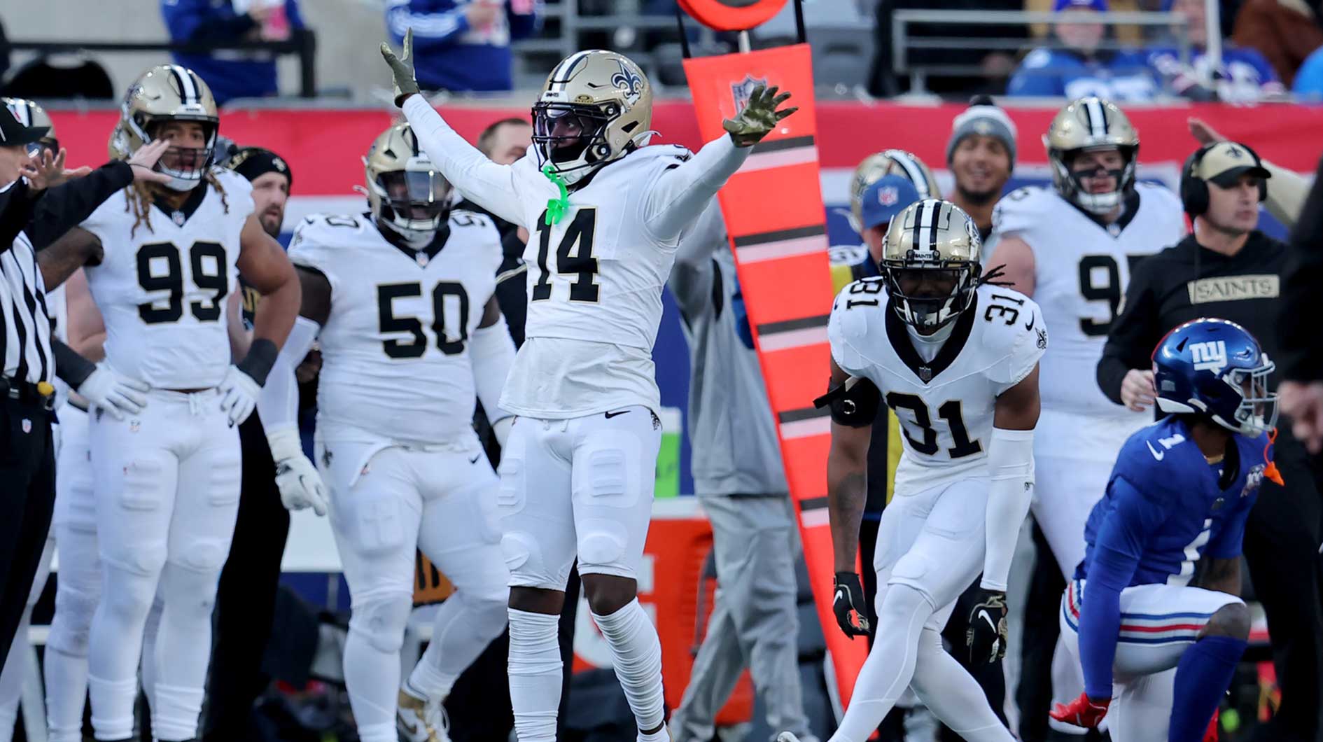 New Orleans Saints cornerback Kool-Aid McKinstry (14) reacts after breaking up a pass intended for New York Giants wide receiver Malik Nabers (1) during the second quarter at MetLife Stadium