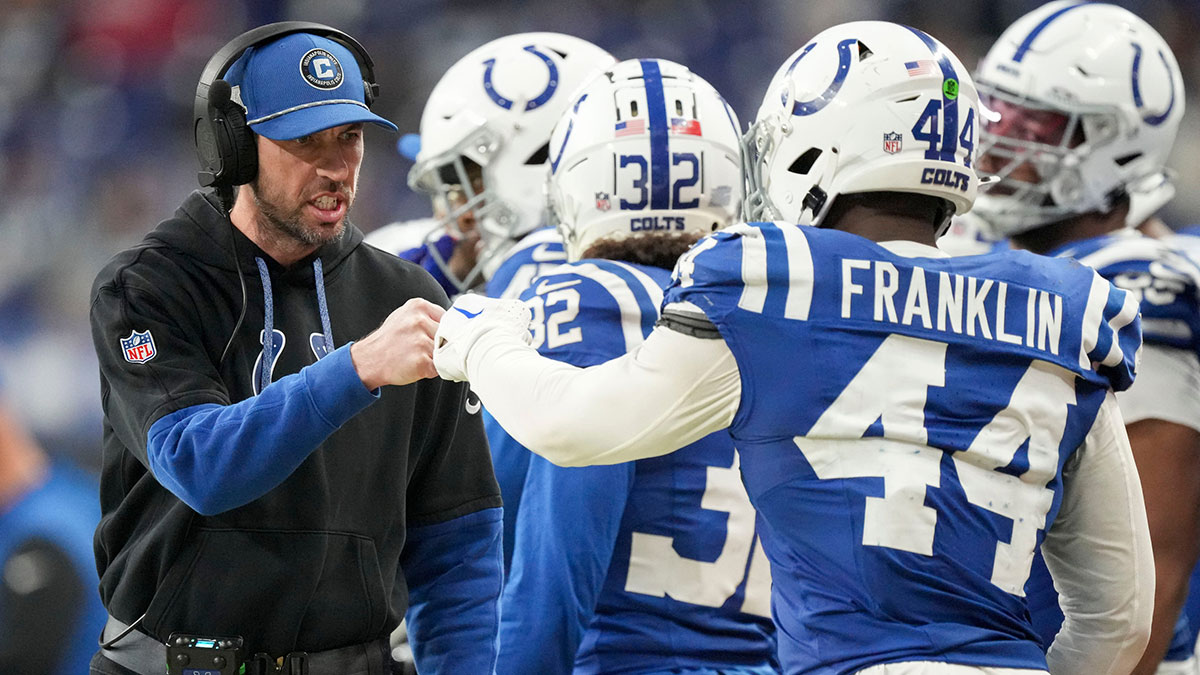 Indianapolis Colts Head Coach Shane Steichen fist bumps Indianapolis Colts linebacker Zaire Franklin (44) on Sunday, Jan. 5, 2025, during a game against the Jacksonville Jaguars at Lucas Oil Stadium in Indianapolis.