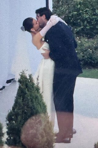BACKGRID Hailee Steinfeld and Josh Allen kiss during their wedding ceremony
