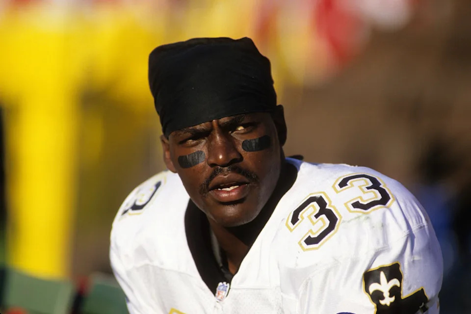SAN FRANCISCO - OCTOBER 29: Cornerback Tyrone Hughes #33 of the New Orleans Saints takes a rest on the bench during the game against the San Francisco 49ers at Candlestick Park on October 29, 1995 in San Francisco, California. The Saints won 11-7. (Photo by George Rose/Getty Images)