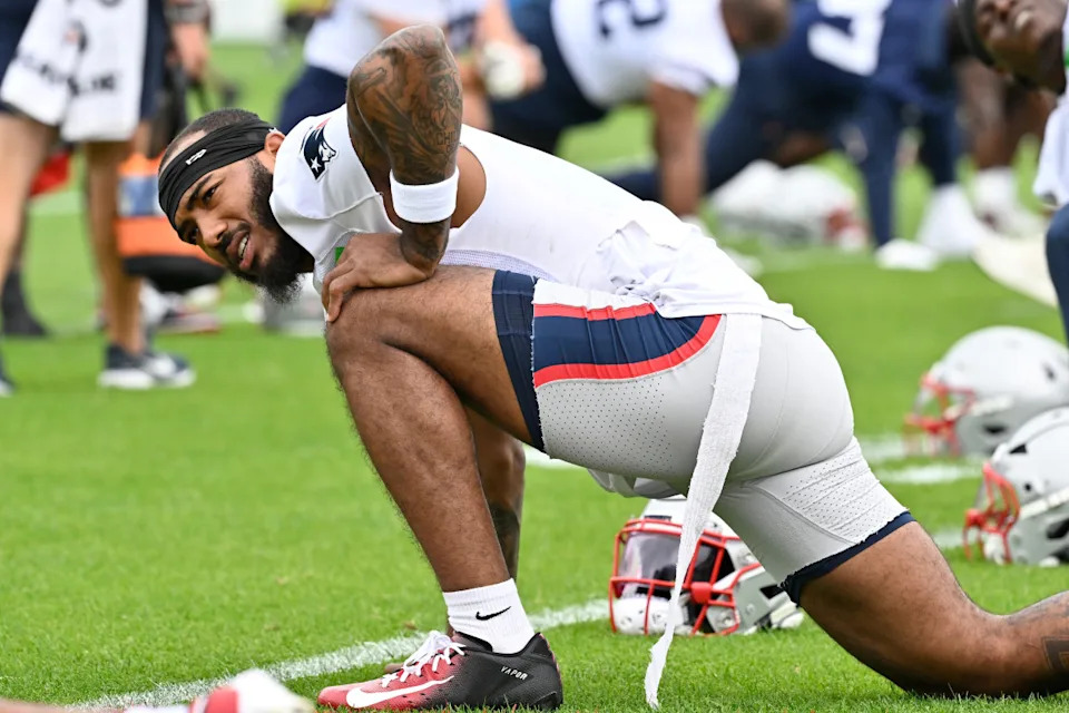 New England Patriots wide receiver Ja'Lynn Polk (1) stretches during minicamp at Gillette Stadium.Eric Canha-Imagn Images