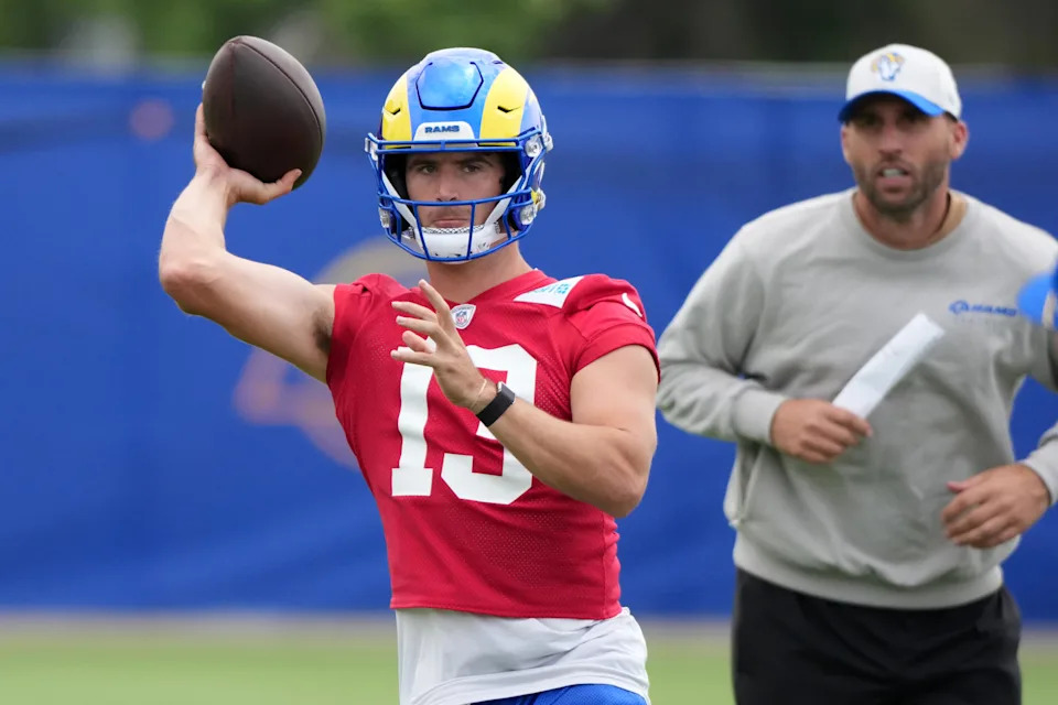 Los Angeles Rams quarterback Stetson Bennett (13) throws the ball