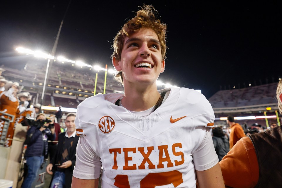 Arch Manning #16 of the Texas Longhorns celebrates after a football game.