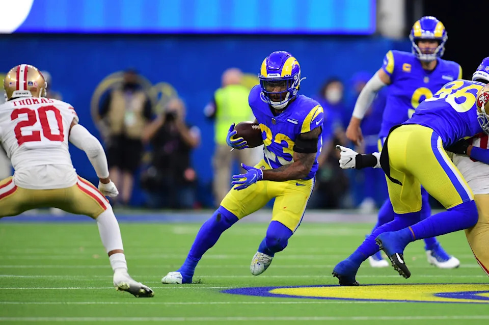 Los Angeles Rams running back Cam Akers (23) runs the ball against the San Francisco 49ers during the 2022 NFC Championship Game. Mandatory Credit: Gary A. Vasquez-Imagn Images