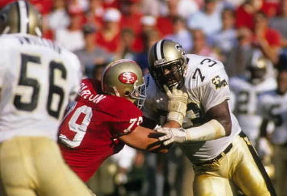 New Orleans Saints defensive end Frank Warren (73) in action against the San Francisco 49ers. Credit: saintshalloffame.com 