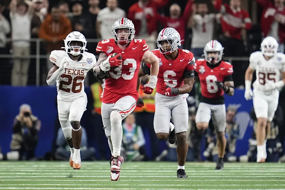 Ohio State Buckeyes defensive end Jack Sawyer returns a fumble recovery for a touchdown against the Texas Longhorns during their Cotton Bowl playoff game on Jan. 10.Adam Cairns / Columbus Dispatch / USA TODAY Network via Imagn Images