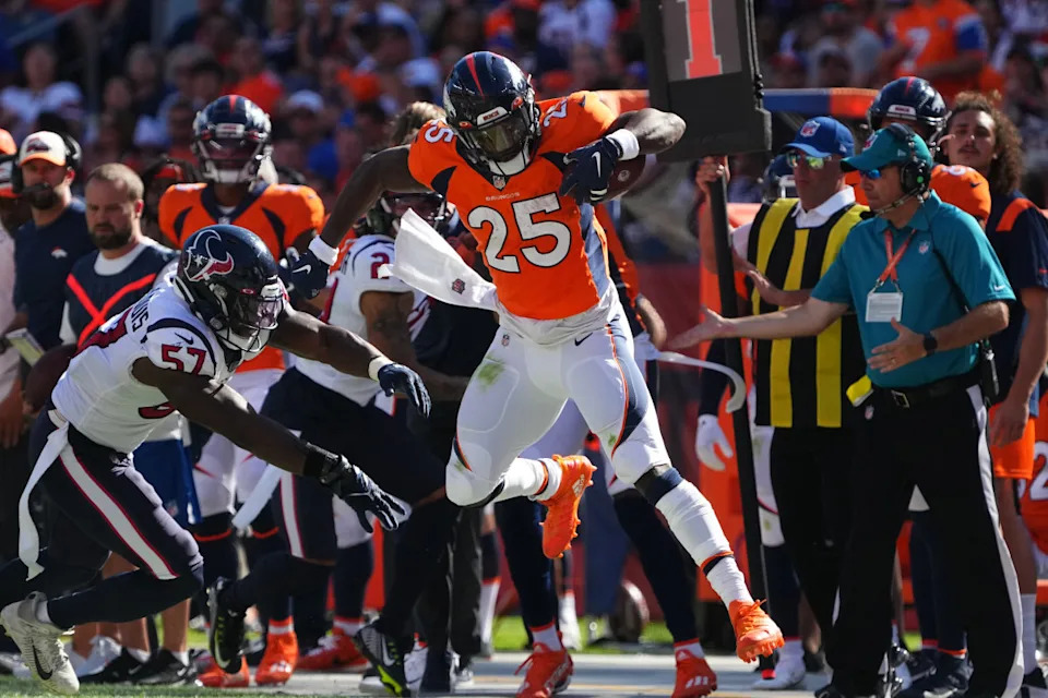 Houston Texans linebacker Kevin Pierre-Louis (57) pushes Denver Broncos running back Melvin Gordon III (25) out of bounds in the second quarter at Empower Field at Mile High.Ron Chenoy-Imagn Images