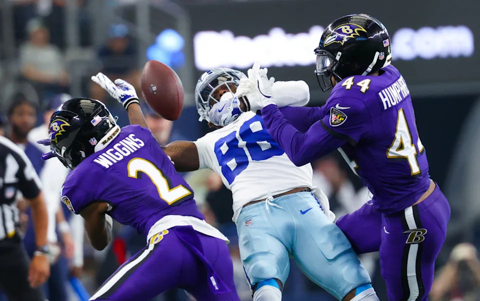 Baltimore Ravens cornerback Nate Wiggins (2) and Baltimore Ravens cornerback Marlon Humphrey (44) defend a pass intended for Dallas Cowboys wide receiver CeeDee Lamb (88) during the second half at AT&T Stadium© Kevin Jairaj-Imagn Images