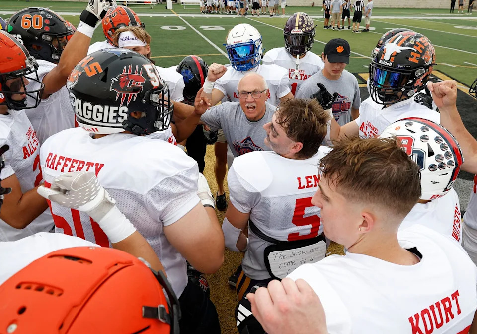 Onsted coach Randy Hutchinson talks to the Lenawee players before the Monroe County vs. Lenawee County All-Star Football Game at Adrian College on Friday, June 20, 2025.